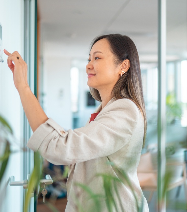 Person using wall-mounted display